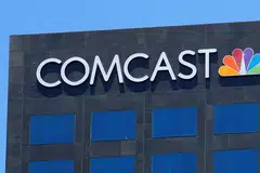 
                                        Logo da Comcast em um prédio de Los Angeles (Foto: MIKE BLAKE / REUTERS)
